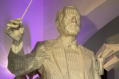 Tchaikovsky's sculpture made of sheet music branding