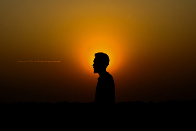 Stock:00004 ✨Silhouette Serenity: Sunset Behind a Man 🌆 beauty contemplation dusk end of day evening golden golden hour nature beauty orange peaceful reflection serene silhouette sky sunset sunset behind a man tranquility