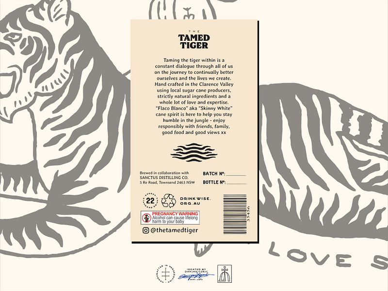 The Tamed Tiger Back Label Design bottle brand design brand identity branding branding design hand drawn identity design label label design liquor logo logo design packaging packaging design product label rum typeface typography vintage visual identity