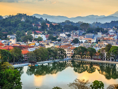 Kandy Lake reflects the city's beauty. kandy kandy lake lake lake photography photo photography sri lanka sri lankan photography