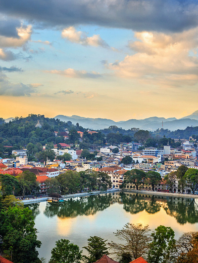 Kandy Lake reflects the city's beauty. kandy kandy lake lake lake photography photo photography sri lanka sri lankan photography