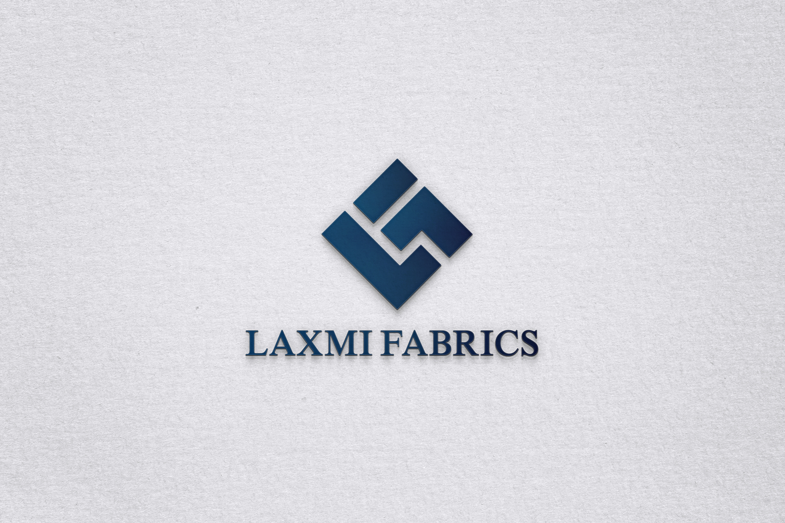 Elevating Style: Logo Reimagining for Laxmi Fabrics designcommunity