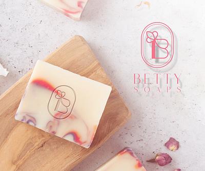 Betty Soaps Logo brand branding company design graphic design hands homemade illustration logo logo design mockup planet slides soaps soaps logo towel