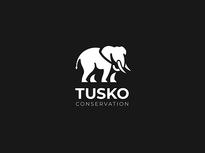 Tusko animal black conservation design elephant logo minimal negative space tusk white