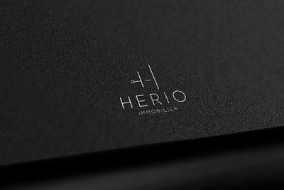 Logo Design for Herio Immobilier branding classy creative design elegant font stylized graphic design illustration illustrator immobilier investment logo mockup photoshop professional property silver stylized typography vector