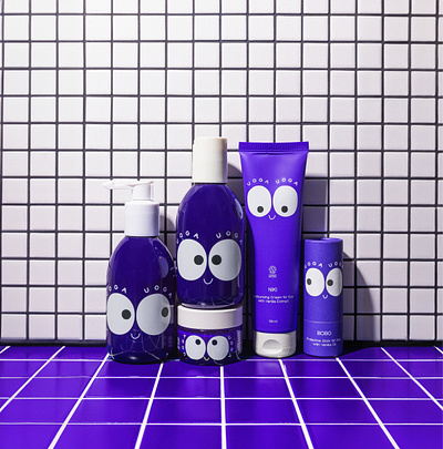 Uoga kids bold bottle brand branding eyes identity kids packaging purple symbol