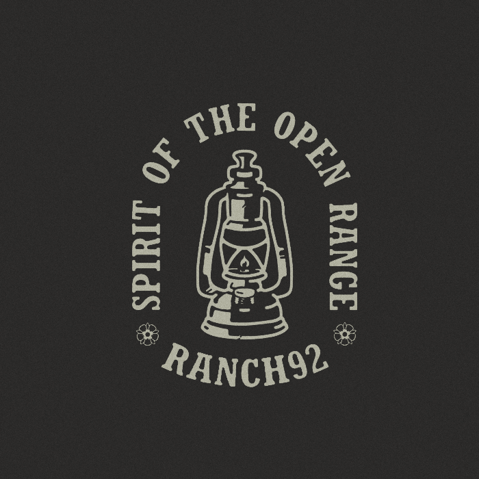 lantern illustration, black and white, text arround it says spirit of the open range, ranch92