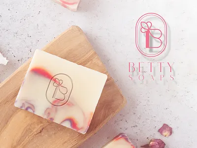 Betty Soaps - Logo Design advertising colors design flowers graphic graphic design hands logo logo design mockup packaging pink planet print slides soap white