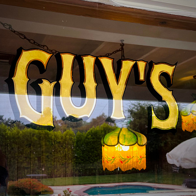 Guy's Saloon - 23 gold leaf 23k gold leaf branding design environmental design gilding gold hand painted sign graphics sign painter sign painting