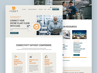 Junot Systems - Home Page blue design home page industrial modern orange ui ux web design website website design