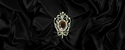 Elegant Brooch on Black Silk | Luxurious Background Enhancement decorative