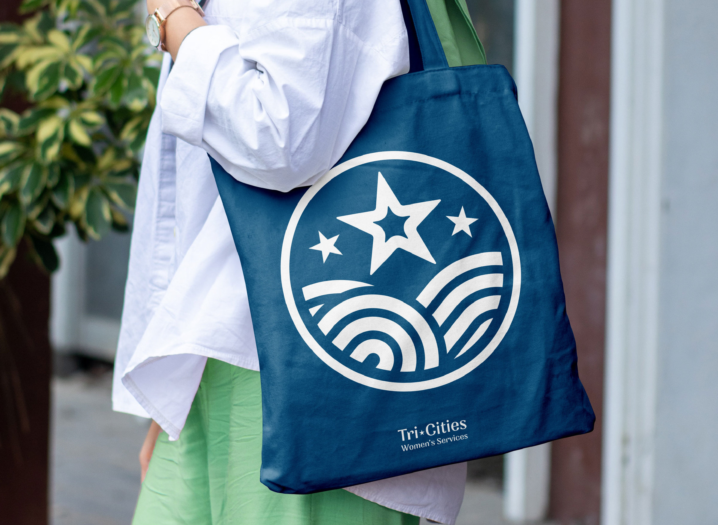 Tri-Cities Women's Services baby brand branding care clean design graphic design hills logo medical minimal pregnancy prolife stars storks trinities vector women