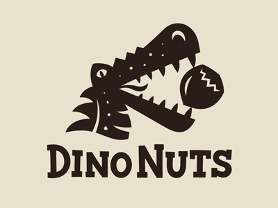 Dino Nuts Logo animal cashew dinosaur emblem food hazelnut head hunter icon insignia logo nut peanut pecan pistachio predator products reptile trademark walnut