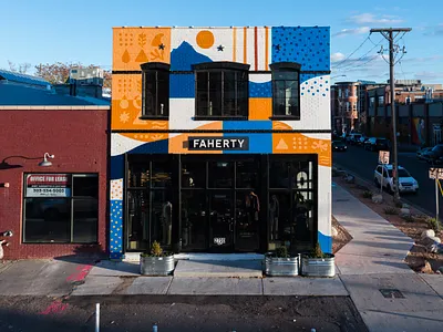 Faherty Store Front Mural, Denver, CO apparel brand blue blue and orange branded mural denver faherty mountain mural mural mural design mural painting nature ocean design ocean mural orange orange and blue painting rino art district vicarel studios