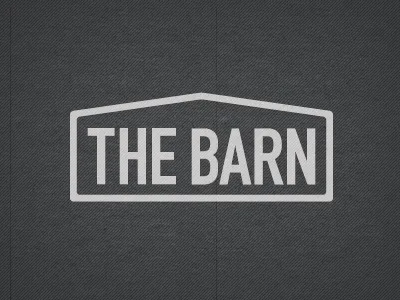 THE BARN black cream design logo white