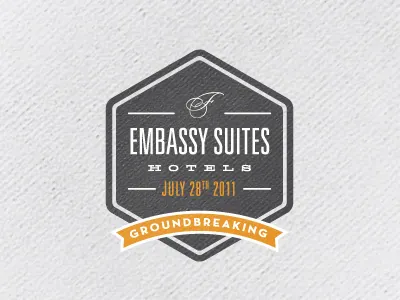 Embassy Suites Hotels Groundbreaking Seal badge banner hellenic wide seal texture type typography