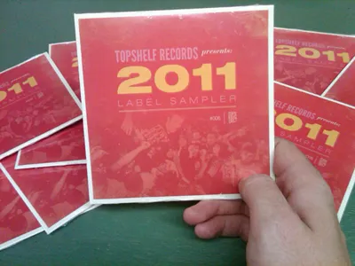 and they're in! bodoni cd helvetica league gothic print topshelf records type