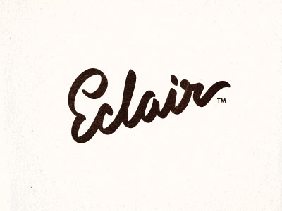 Eclair brush calligraphy chocolate design eclair lettering logo unused