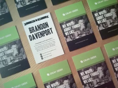 100% Re-used paper, printed using wind power business cards green okay geek omg