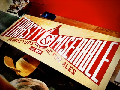 Thirsty & Miserable bar beer lettering paint sign sign painting typography wood