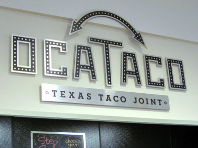 ocaTaco aluminum arrows dots logo signage taco