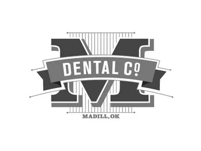 Madill Dental "M" banner company crest dental lines m ribbon