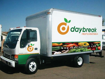 Daybreak Logo (On a Truck) d fruit green landon leaf logo orange presentation rick rick rick landon rick landon design target truck vector