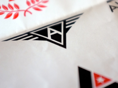 Alpha — No.2 black logo triangle wings