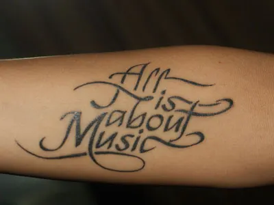 Tattoo with the Bispo typeface bispo font calligraphy tattoo typography