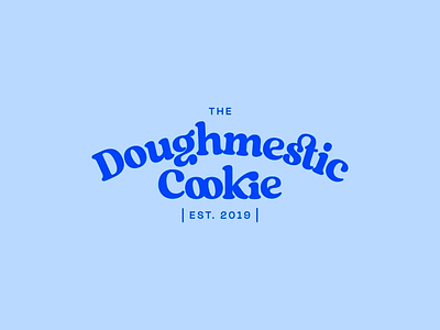 The Doughmestic Cookie Logo blue color bold text brand brand identity branding custom font design elegant style graphic design lettering light blue background logo modern design rounded font script font stacked text text logo typeface typography visual identity