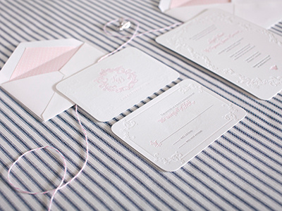 Laura & Ben Wedding Invitations blind press monogram pink traditional wedding