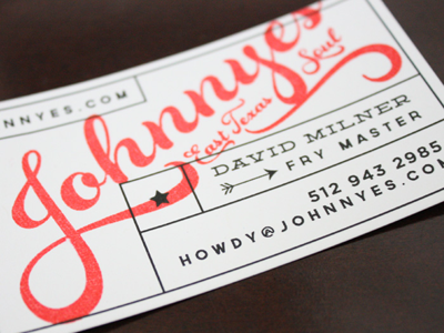 Another Card. black business card red stamp white