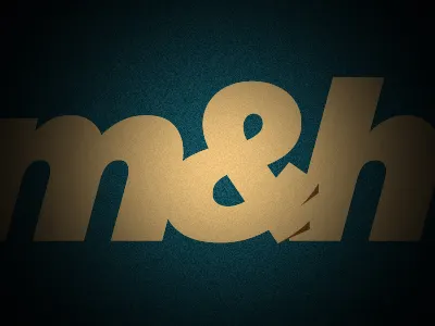m&h in progress logo type