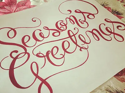 Season's Greetings hand holiday lettering script