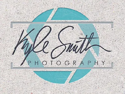 Kyle Smith Photography aperature blue brackets camera design gotham grey identity kraft letterpress logo navy paper photography signature