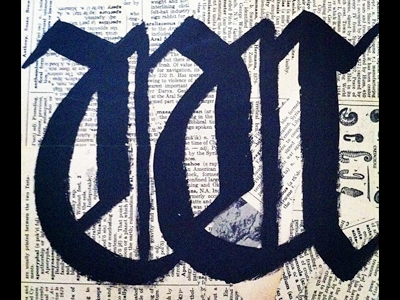 W blackletter calligraphy type typography w