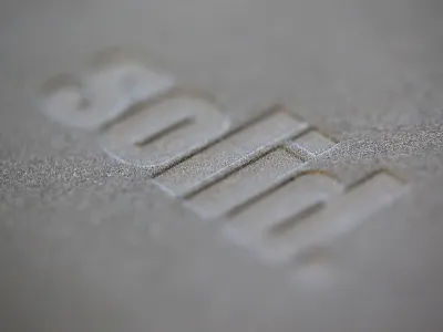 Solid. concrete deboss duplex gmund grey letterpress punch solid