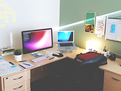 ma workspace contained desk fish tank posters walls whiteboard work space