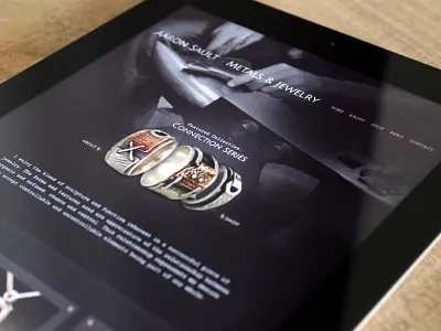 Aaron Sault Jewelry dark design elegant seagulls jewelry metals rings type typography web website