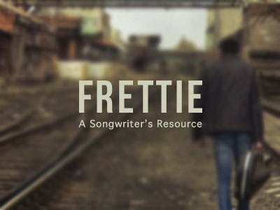 Frettie Logo Option B brown circle frettie logo music songwriting vintage