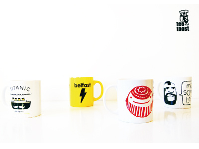 tee and toast mugs. belfast cranes moustache mr t mugs scotland tea teacakes titanic tunnocks yellow