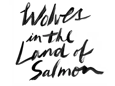 Wolves in the Land of Salmon brush lettering type