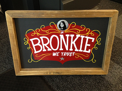 In Bronkie We Trust lettering painted sign