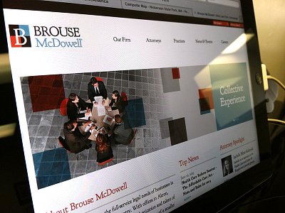 Brouse McDowell blue design law logo orange typography website