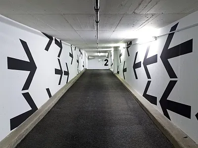 orientation system underground car park at a skyscraper car park orientation system signs skyscraper typography