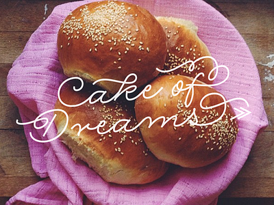 Cake of Dreams baking buns logo rolling pen type