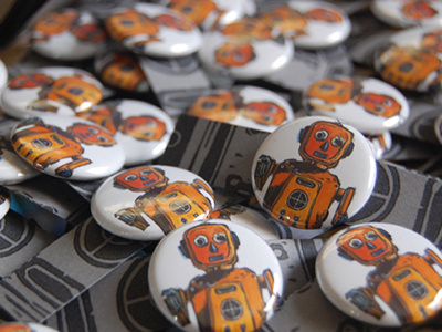 August 2012 Button Club buttonclub letterpress pinback buttons robot