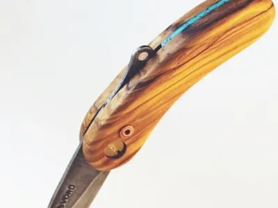 Kut Olivewood w/turquoise hand made knife wood