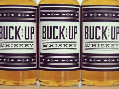 buck up whiskey bottle buckup design moonshiner packaging typography