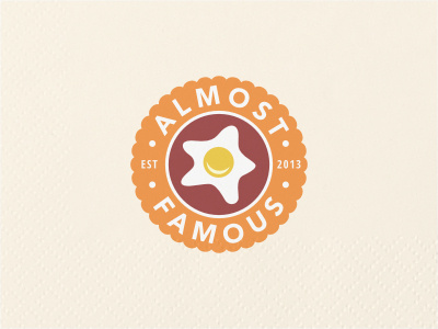 Almost Famous circular crest egg emblem food health logo nature orange red restaurant yolk